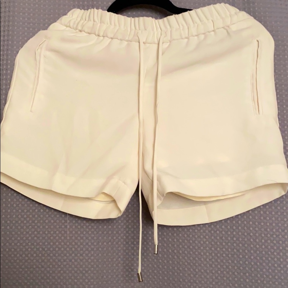 double lined cream shorts